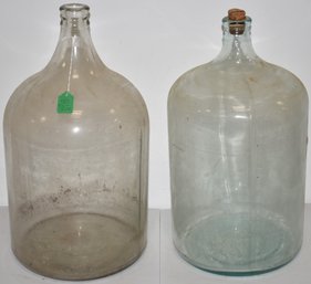 (2) LARGE GLASS WATER BOTTLES