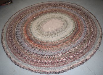 ROOMSIZED OVAL HAND BRAIDED RUG