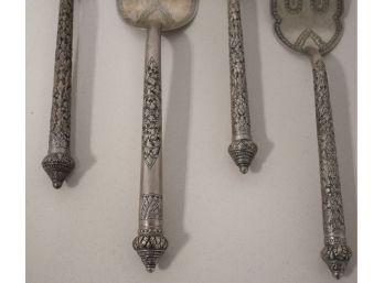 4 PIECE EMBOSSED INDIAN SILVER FLATEWARE
