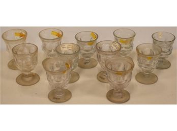 11 EARLY FLINT GLASS EGG CUPS