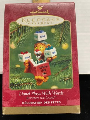 Hallmark Keepsake Christmas Ornament  2001 Between The Lions Lionel Plays With Words B100