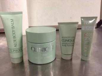 CLINIQUE Lot (7 Day Scrub Cream, Aloe Body Balm, Sun Block, Body Formula)