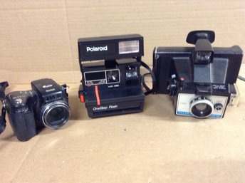Vintage Polaroid Camera And Kodak Digital Camera