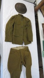 WWI Era Army Uniforms And Helmet, Cartridge Belt And Nap Sap