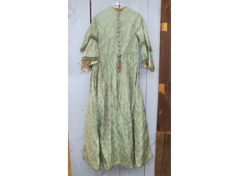 Green Victorian Dress With Green Ribbon Decoration On Sleeves