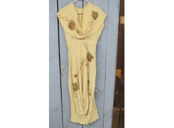 Beige Sleeveless Dress With Amber Applique In A Floral Pattern