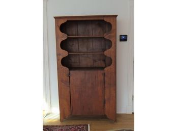 Early Pine Upright Cupboard With Bootjack Sides And Shaped Feet