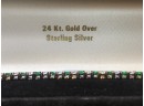 24k GOLD OVER STERLING SILVER EMERALDS AND DIAMOND CZ’s BRACELET