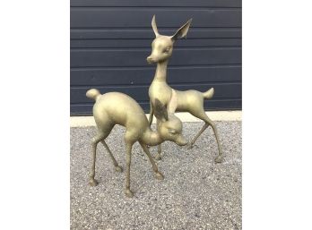 PAIR OF VERY LARGE BRASS MOTHER DEER AND DOE SCULPTURES