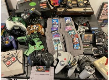 Vintage Grouping Of XBox And Nintendo Games And Accessories