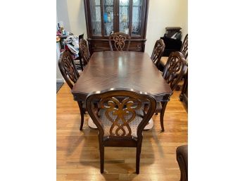 Contemporary Wood Dining Table With Leaves, Pads And 8 Chairs