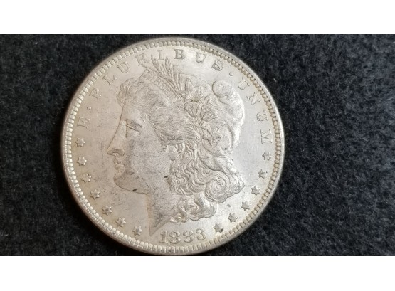 US 1883 Morgan Silver Dollar - AU In Coin Holder