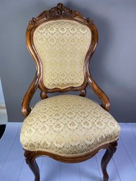Vintage Or Antique Carved & Upholstered Chair With Solid Wood Frame And Casters