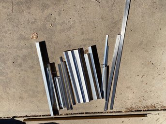 Several Pieces Of Angle Aluminum, Straight Edges, Brackets And More