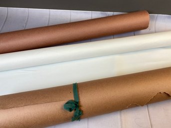 Two Rolls Of Construction Or Crafting Paper And A Roll Of Vinyl-backed, White Canvas