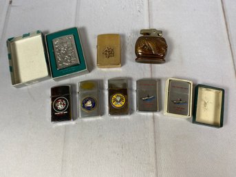 Collection Of Vintage Lighters With Various Graphics, Including USS Yorktown, The Windjammer & More