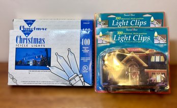 Two Packs Of White Icicle Lights And Light Clips