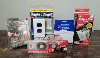 Assortment Of Electronics And Wall Safe