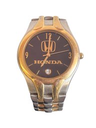 Honda Black, Gold, And Silver In Color Mens Watch