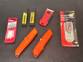 Assortment Of Box Cutters And Razor Blade Accessories