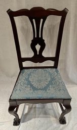 Dark Colored Upholstered Seated Chair