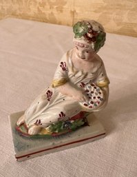 Porcelain Woman Figurine With Basket Of Flowers