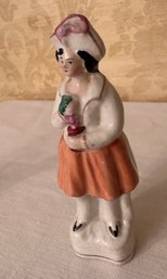 Antique Porcelain Woman Figurine Holding Flowers