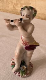 Porcelain Cherub Figurine Playing Flute