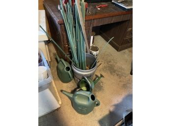 Garden Stakes And Watering Cans