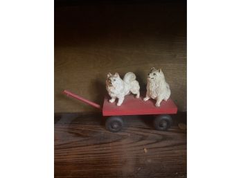 Vintage Dog Statues On Wagon