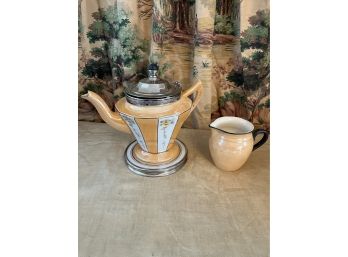 Vintage Teapot, Creamer, And Trivet