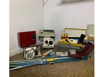 Slide Projectors And Screen With Many Slides