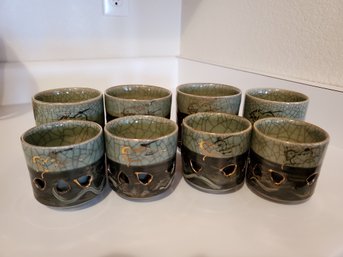 Eight Decorative Green Cups