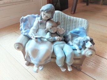 Lladro Girl Reading To Child With Dog On The Couch