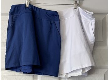 READY FOR THE LINKS!! LOT OF 2 WOMENS WHITE AND NAVY GOLF SKIRT SIZE XS