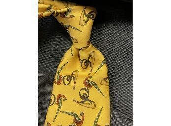 TOOT THIS HORN!! SALVATORE FERRAGAMO MADE IN ITALY PHEASANT HORN ON YELLOW BACKDROP SILK TIE