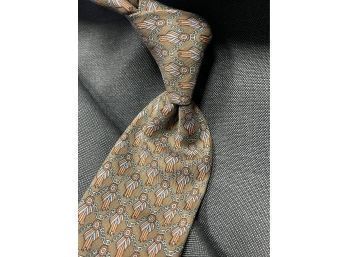 NEAR MINT AND AUTHENTIC HERMES PARIS BROWN GEOMETRIC SILK TIE WITH RIBBONS AND CHAINS 716FA