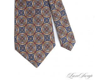 AUTHENTIC BURBERRY LONDON MENS SILK TIE IN NAVY BLUE BASE WITH QUATREFOIL ROUNDEL MOSAICS