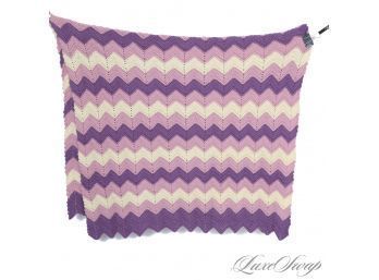 A LARGE AND EXPERTLY CROCHET HAND KNITTED THROW BLANKET IN RICH PURPLE AND CREAM CHEVRONS