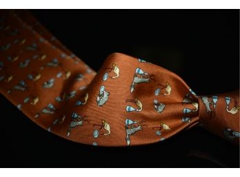 LIKE NEW AUTHENTIC HERMES MADE IN FRANCE BUTTERSCOTCH WHIMSICAL FOX STORK SILK TIE