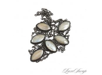 A VERY DECADENT AND COOL BLACKENED SILVER DOUBLE CHAIN NECKLACE WITH 6 HUGE DIAMOND SHAPED ABALONE COINS