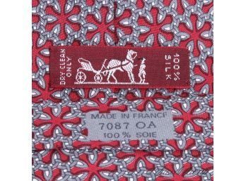 AUTHENTIC HERMES PARIS MADE IN FRANCE MENS SILK TIE IN RED WITH BLUE/GREY STARFISH GEOMETRIC PRINT 7087 OA
