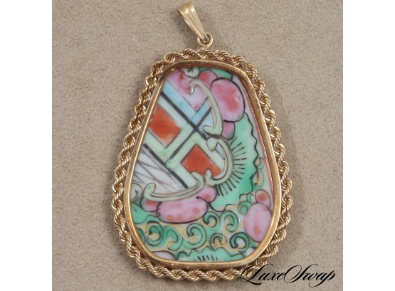 ONE UNMARKED BUT LIKELY 14K YELLOW GOLD BRAIDED EDGE PENDANT WITH PAINTED PORCELAIN INSET 18.9GRAMS