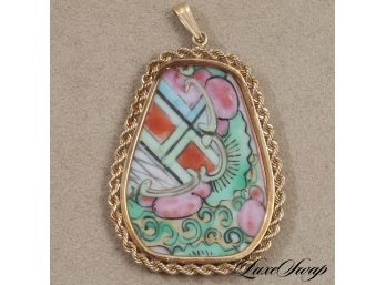 ONE UNMARKED BUT LIKELY 14K YELLOW GOLD BRAIDED EDGE PENDANT WITH PAINTED PORCELAIN INSET 18.9GRAMS