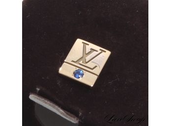 A VERY RARE LOUIS VUITTON 10K YELLOW GOLD AND SAPPHIRE PIN