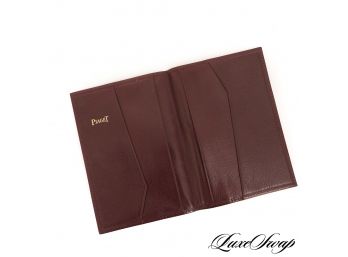 A RARE AND NEW WITHOUT BOC PIAGET WATCHES / KLOTZL GENEVE ROUGE LEATHER PASSPORT WALLET
