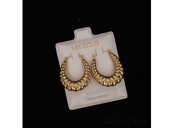 ONE PAIR OF BRAND NEW IN BOX 14K YELLOW GOLD CROISSANT HUGGIE EARRINGS