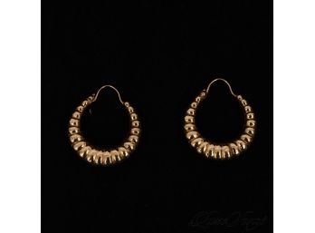 ONE GORGEOUS PAIR OF LIKE NEW UNMARKED BUT TESTED 14K CROISSANT HUGGIE EARRINGS .09G