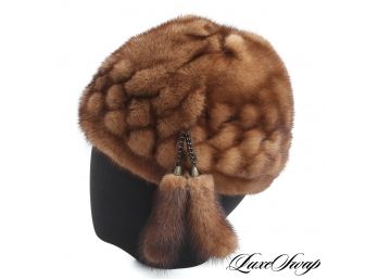 LIKE NEW AND HIGHLY INTRICATE GENUINE MINK FUR HAT WITH BRAIDED DETAIL, TASSELS, AND INTERNAL CINCHED ADJUSTOR