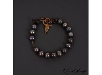 EXQUISITE BLACK PEARL BRACELET MOUNTED ON LEATHER CORD AND BRASS STEERHEAD CHARM